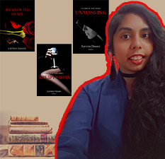 Mauritian woman and author in blue with red outline taking selfie with three black books behind her and a stack of old manuscript beside her. Background is beige, almost sandy colour.